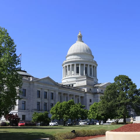 Dome of the state capitol building is seen on the center left of the frame.