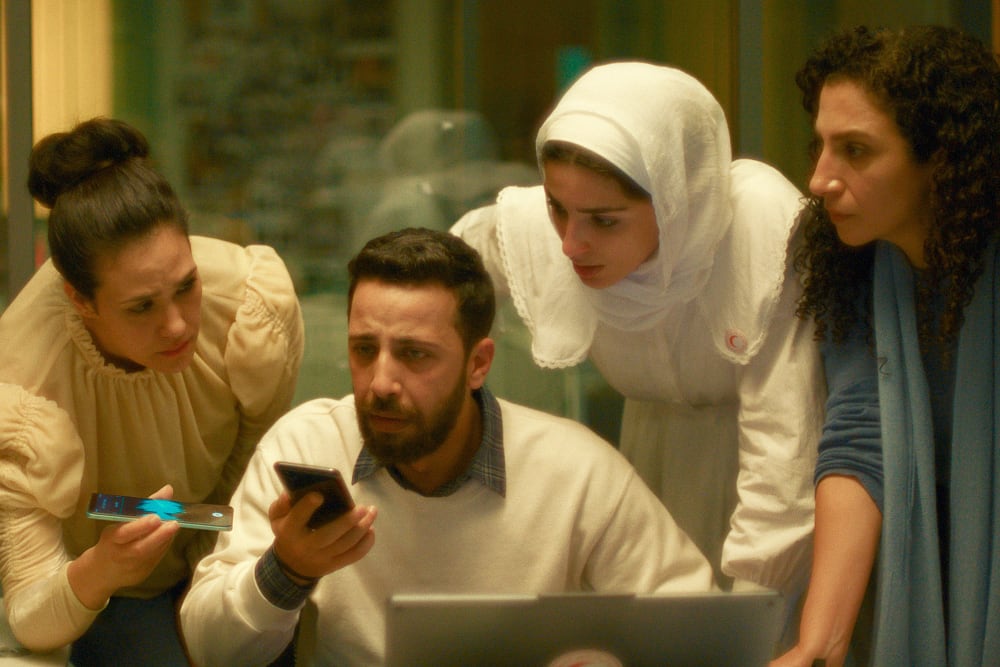 Still from "The Voice of Hind Rajab" with Motaz Malhees, Saja Kilani and Clara Khoury.