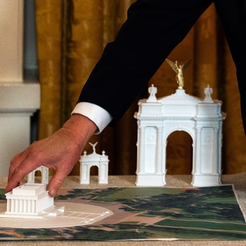 A model of an arch while US President Donald Trump delivers remarks during a ballroom fundraising dinner in the East Room of the White House.
