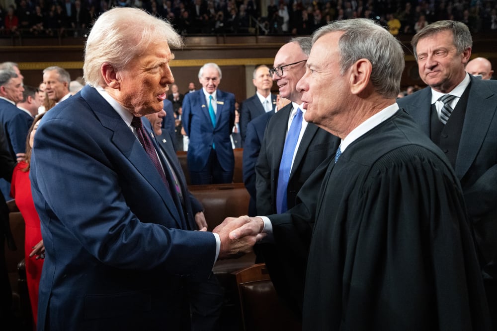 President Donald Trump greets Chief Justice of the United States John G. Roberts Jr.