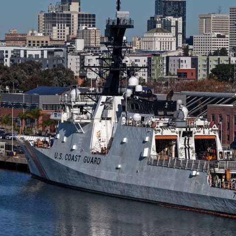 A U.S. Coast Guard cutter sits docked at Coast Guard Island Alameda