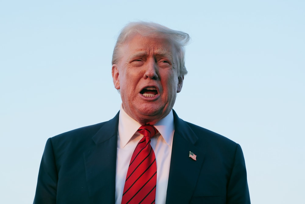 U.S. President Donald Trump speaks to reporters near Air Force One on Aug. 03, 2025 in Allentown, PA.