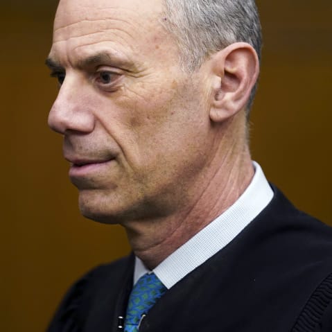 Judge Boasberg's profile is seen in a closeup frame, top of his head cropped out.