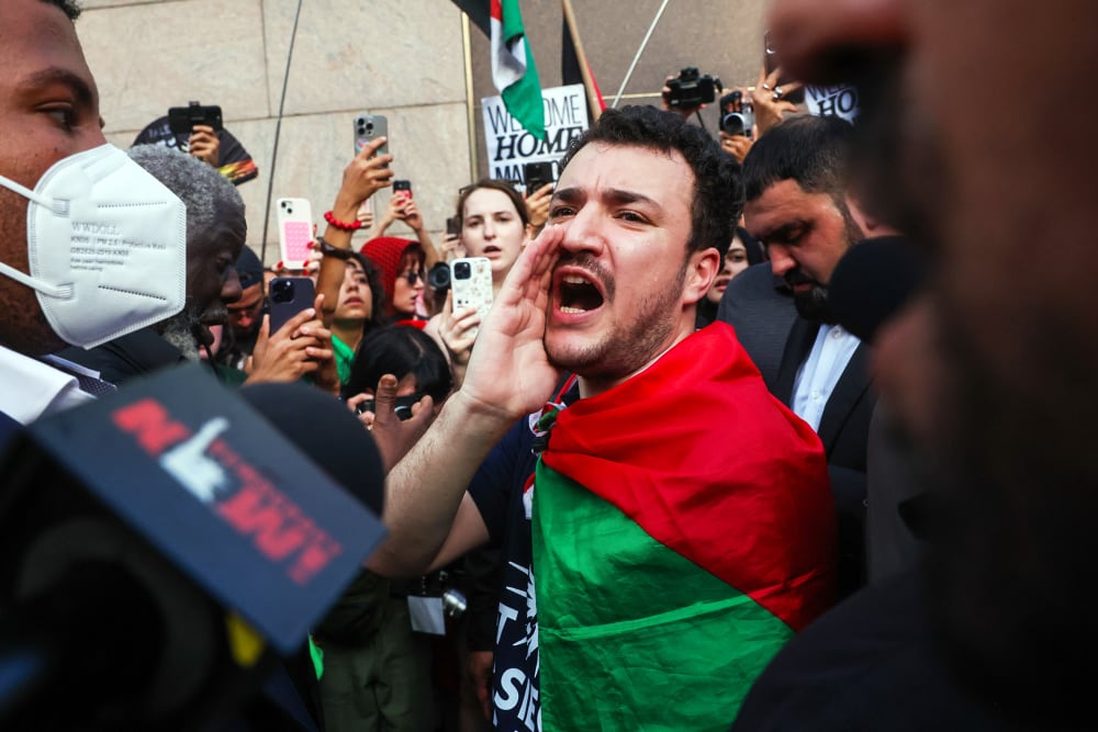 Mahmoud Khalil marches with supporters after he was released from ICE detention during a rally on June 22, 2025 in New York City.