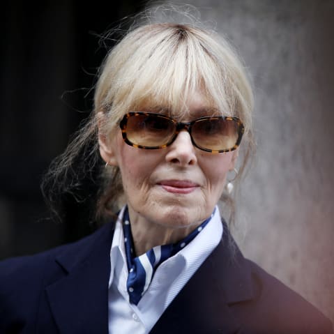 Jean Carroll seen in closeup shot wearing sun glasses.