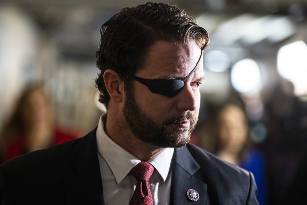 Rep. Dan Crenshaw outside a meeting of the House Republican Conference on Jan. 3, 2023 in the U.S. Capitol.