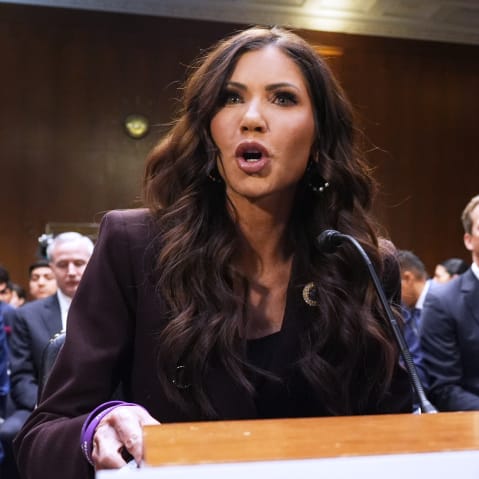 Kristi Noem speaks as she sits front of the committee.