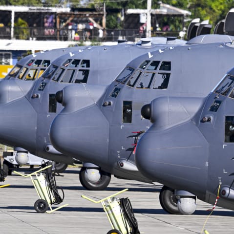US Air Force MC-130 Hercules aircrafts sit on a tarmac on Dec. 29, 2025 at Rafael Hernandez Airport in Aguadilla, Puerto Rico. The United States has deployed a major military force in the Caribbean and has recently intercepted oil tankers as part of a naval blockade against Venezuelan vessels it considers to be under sanctions.