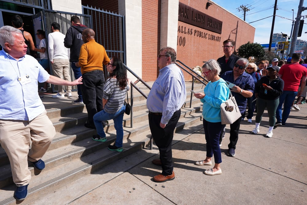 Voters stand in line to vote early for the primary election on Feb. 17, 2026 in Dallas.