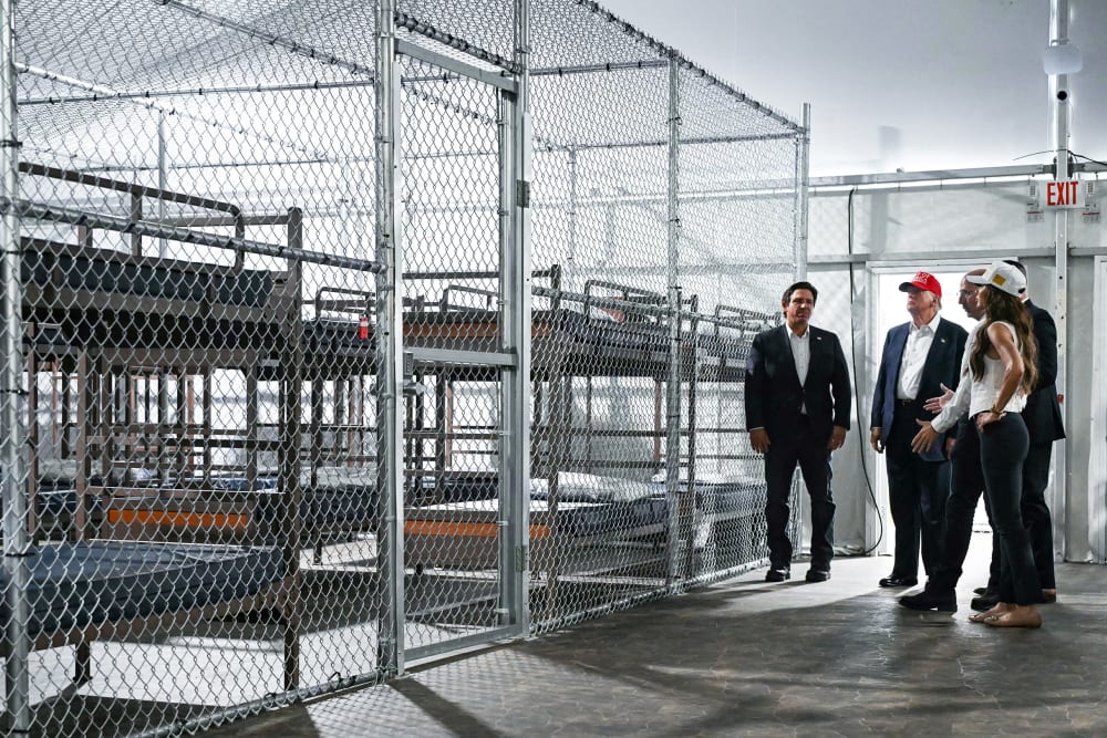 President President Donald Trump and Florida Governor Ron DeSantis tour a migrant detention center, dubbed "Alligator Alcatraz" on July 1, 2025 in Ochopee, FL.