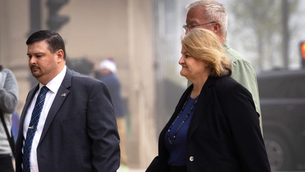 Milwaukee County Circuit Judge Hannah Dugan walks into the Milwaukee Federal Courthouse.