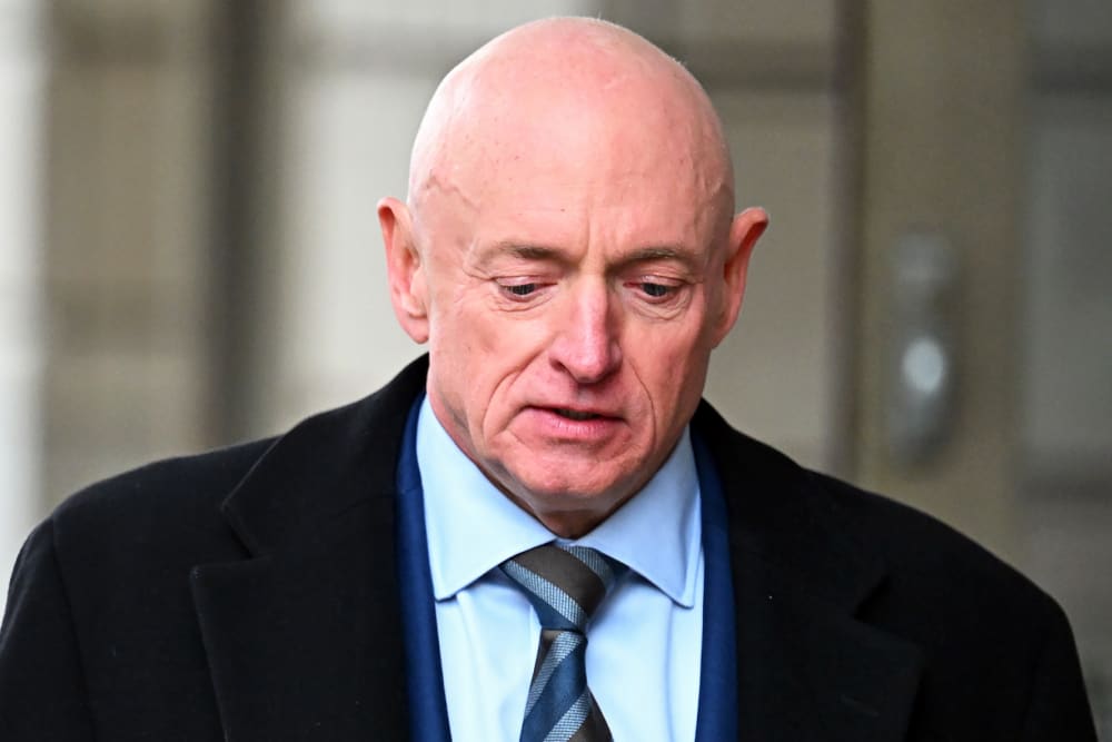 Sen. Mark Kelly exits federal court on Feb. 3, 2026 in Washington, D.C.