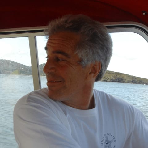 Jeffrey Epstein looking back on a boat.
