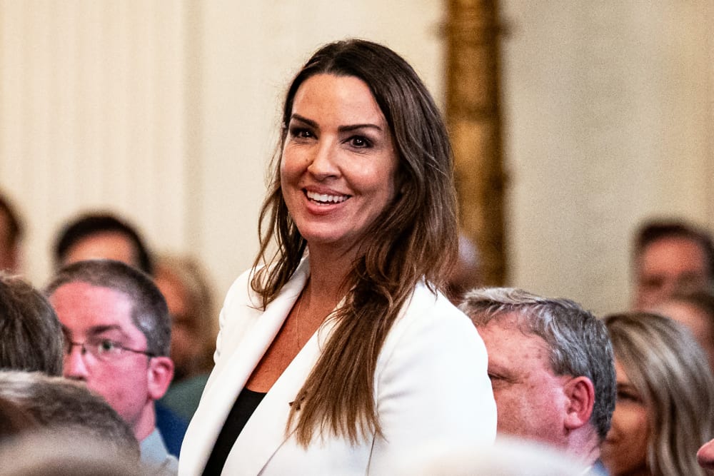 Sara Carter during a bill-signing ceremony on July 16, 2025, in the East Room of the White House.