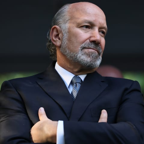 Howard Lutnick with his arms crossed.