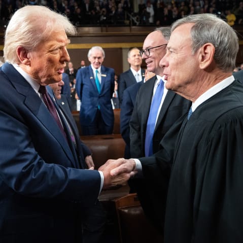 President Donald Trump greets Chief Justice of the United States John G. Roberts Jr.