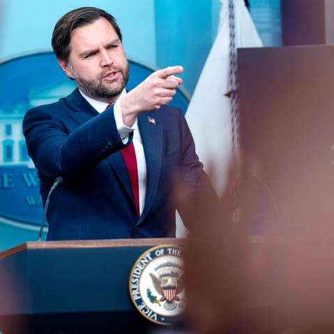 Vice President Vance points at a journalist to ask a question.