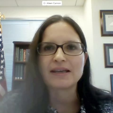 Aileen Cannon is seen speaking on a video conference.