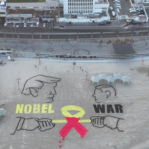An aerial view of drawings as a group of activists in Israel staged a protest near the U.S. Embassy in Tel Aviv calling for a cease-fire in Gaza and the return of Israeli hostages on Sept. 12, 2025.
