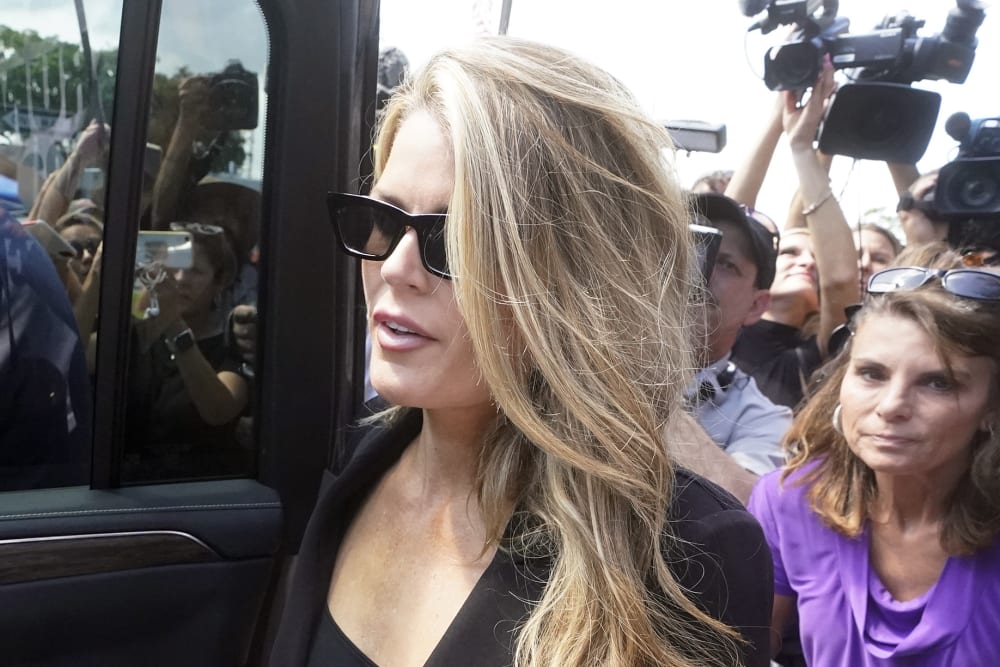 Lindsey Halligan leave the Paul G. Rogers Federal Building and U.S. Courthouse.