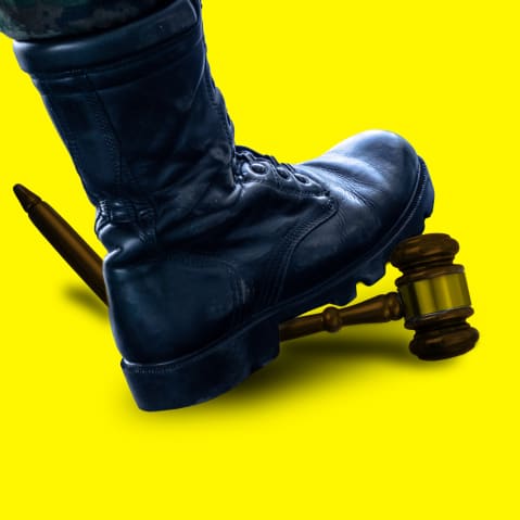 An illustration of a black military style book breaking a judge's gavel