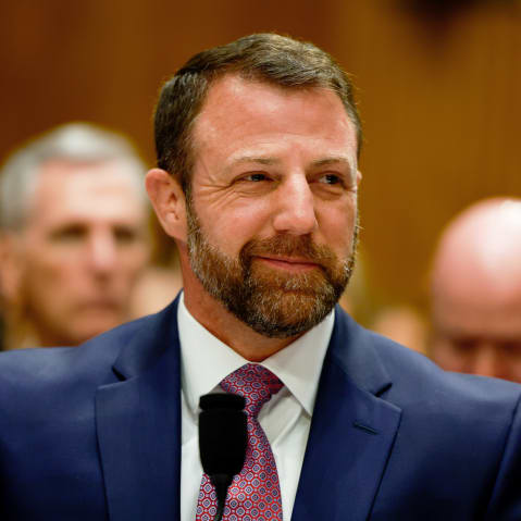 Markwayne Mullin smiles.