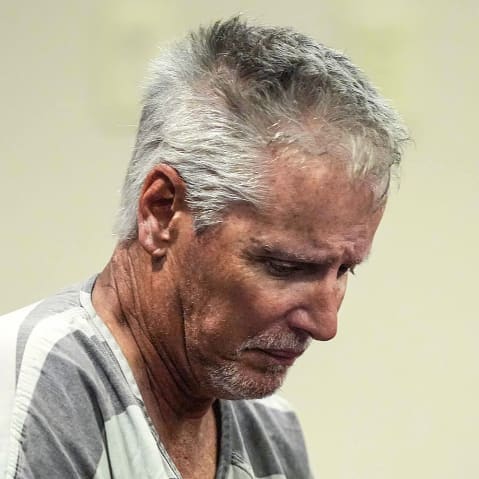 Colin Gray, 54, the father of Apalachee High School shooting suspect Colt Gray, 14, enters the Barrow County courthouse for his first appearance.