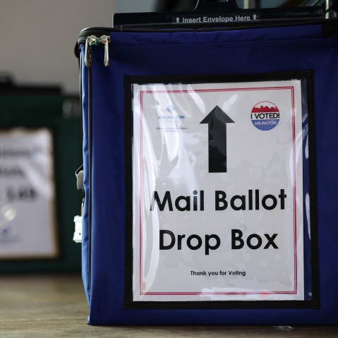 A mail ballot drop box is seen at a polling station