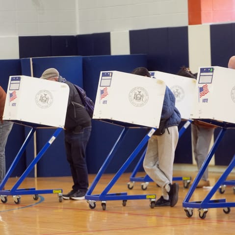 Voters cast their ballots at a polling station in New York City.