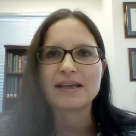 Aileen Cannon is seen speaking on a video conference.