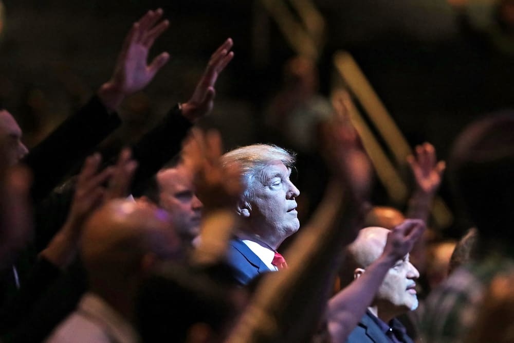 Donald Trump attends a worship service.