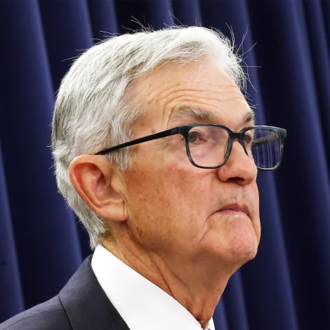 Jerome Powell speaking during a press conference.