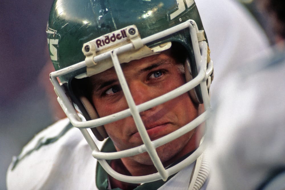 In a close-up shot, Joe Klecko's face is seen through his helmet.