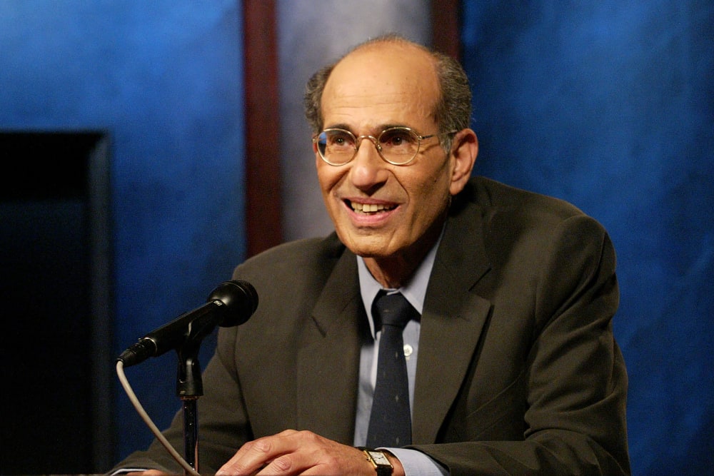 Richard Axel smiling as he answers questions.