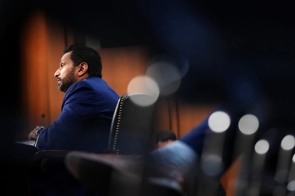 Kash Patel is seen from bottom left side.