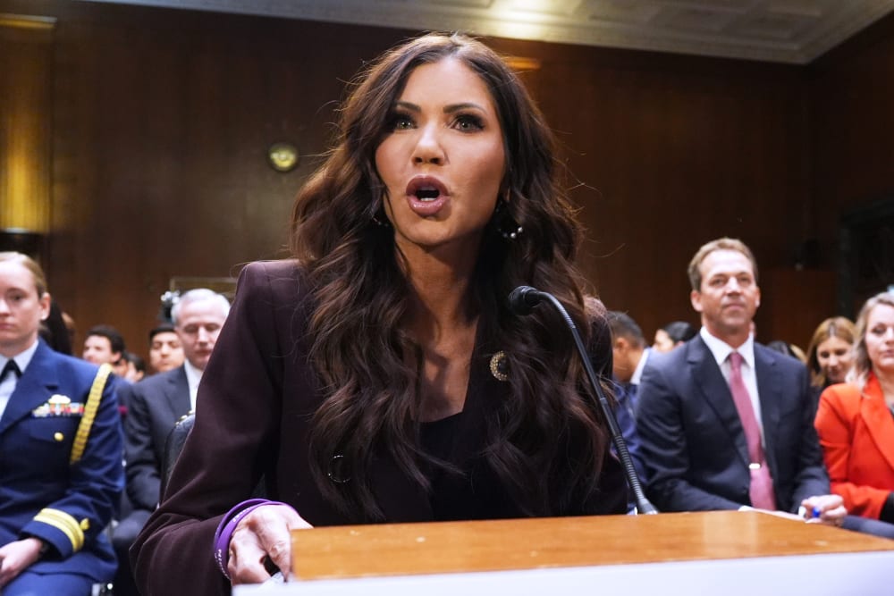 Kristi Noem speaks as she sits front of the committee.