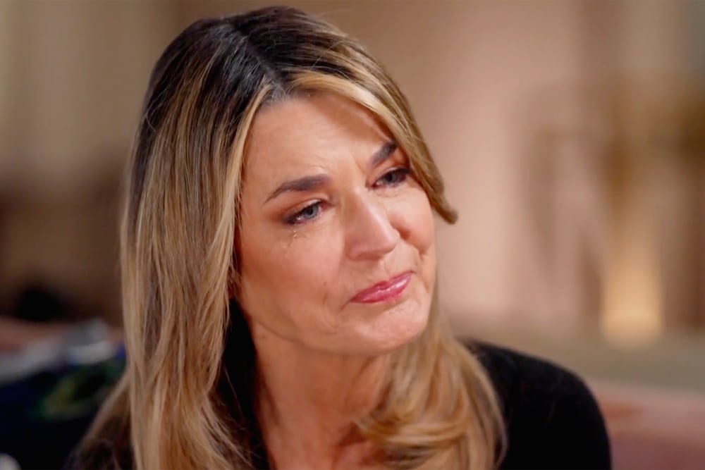 Savannah Guthrie cries as she talks about her mother's disappearance.