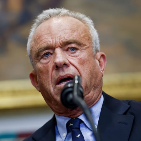 A close-up of Robert F. Kennedy Jr. speaking into a microphone.