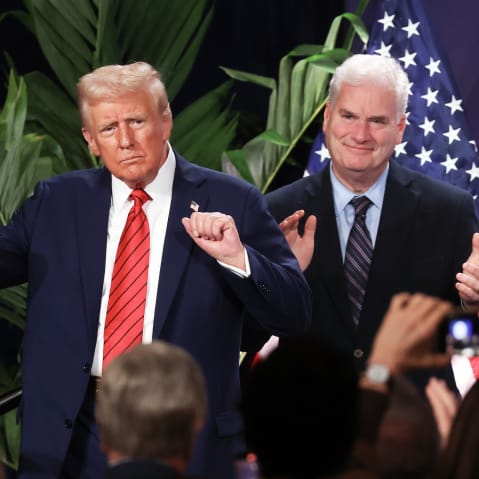 U.S. President Donald Trump dances as House Majority Whip Tom Emmer applauds on Jan. 27, 2025 in Doral, FL.