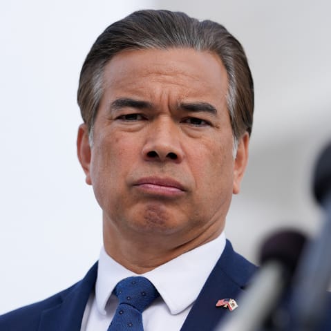 Rob Bonta stands in front of the Supreme Court building.