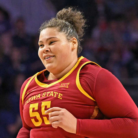 Audi Crooks #55 of the Iowa State Cyclones runs down court.