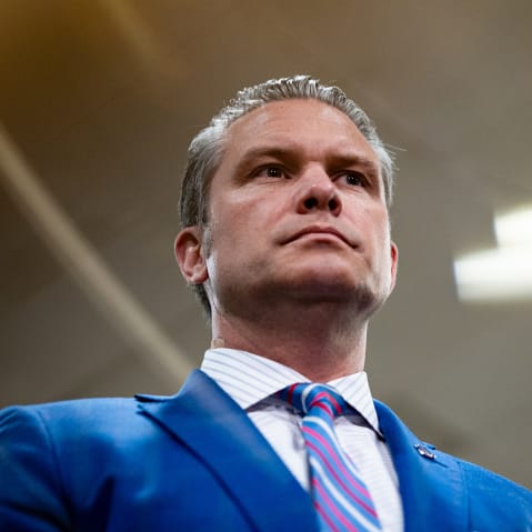 This is a portrait photo of Pete Hegseth shot from below.