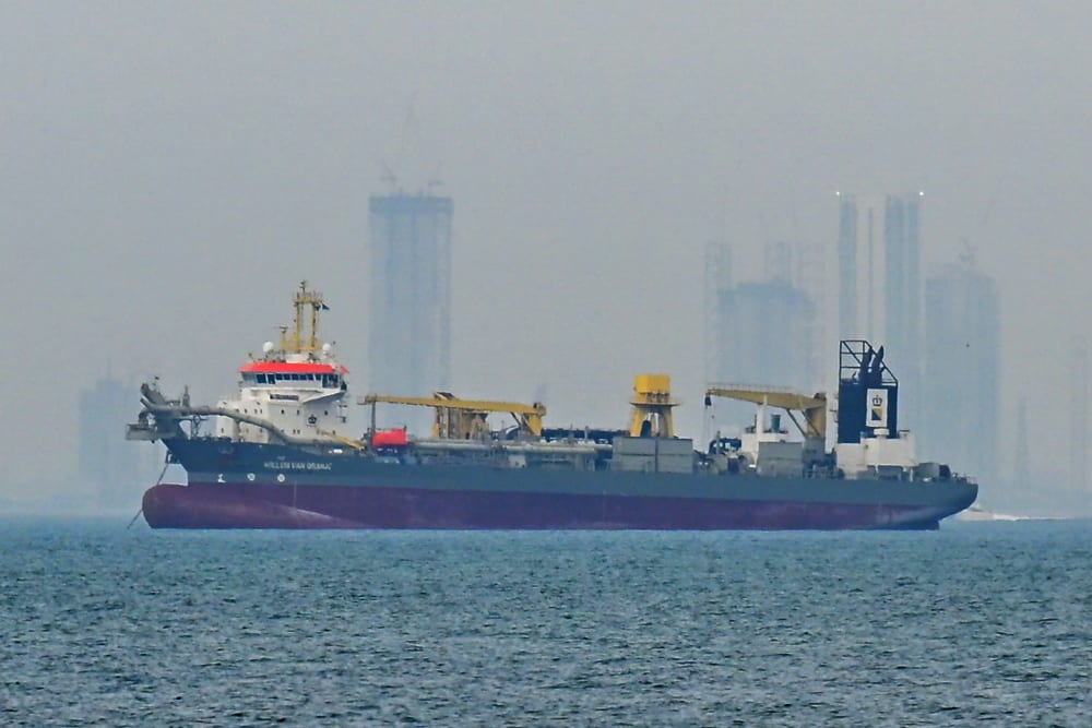 A commercial ship is anchored off the coast of the United Arab Emirates, in the Strait of Hormuz.