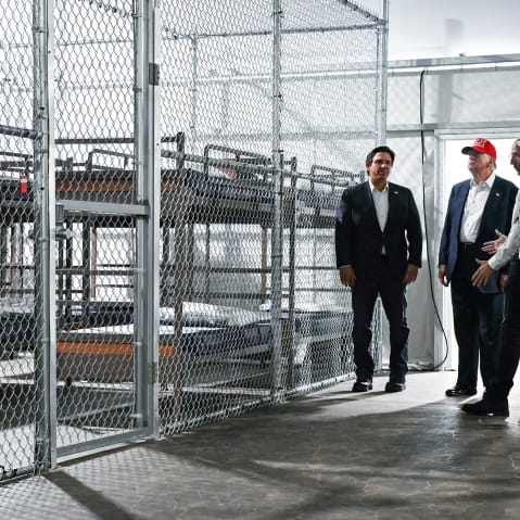 President President Donald Trump and Florida Governor Ron DeSantis tour a migrant detention center, dubbed "Alligator Alcatraz" on July 1, 2025 in Ochopee, FL.