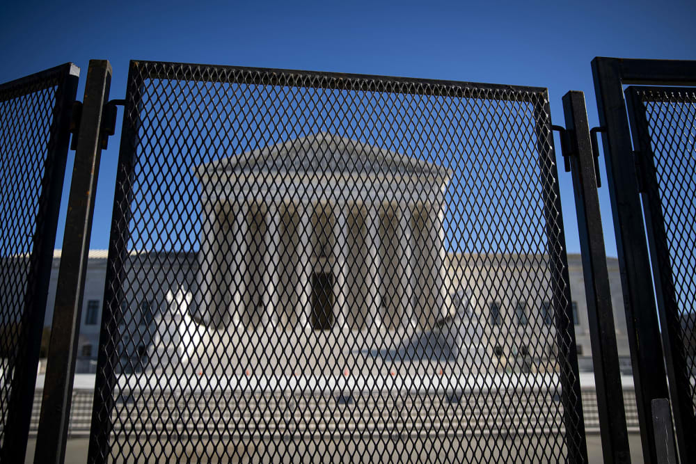 Protective fencing is erected around the U.S. Supreme Court on Jan. 10, 2021.