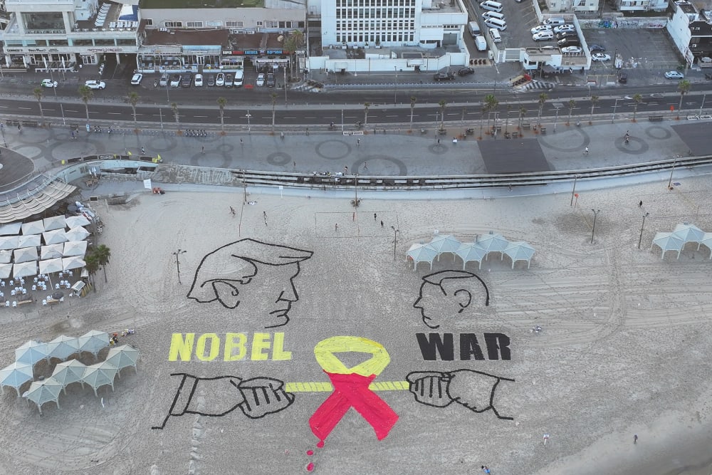 An aerial view of drawings as a group of activists in Israel staged a protest near the U.S. Embassy in Tel Aviv calling for a cease-fire in Gaza and the return of Israeli hostages on Sept. 12, 2025.