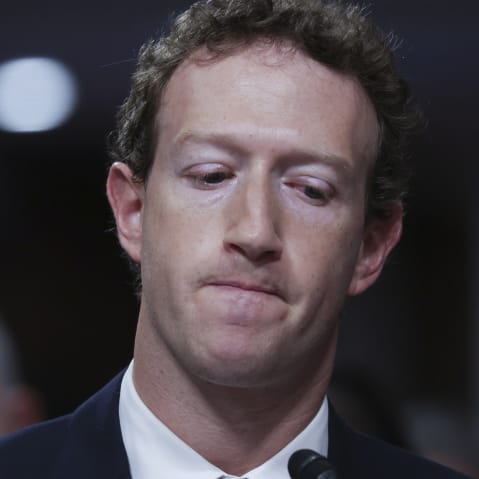 Meta CEO Mark Zuckerberg looks down as he testifies before the Senate Judiciary Committee.