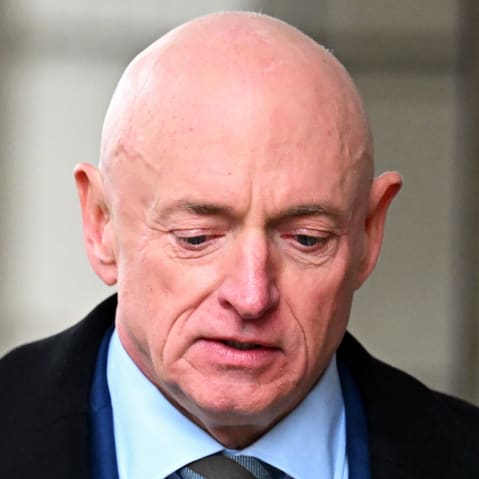 Sen. Mark Kelly exits federal court on Feb. 3, 2026 in Washington, D.C.