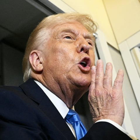 President Donald Trump speaks to the press on March 28, 2025, aboard Air Force One before arriving in West Palm Beach, Fla.