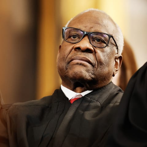 Justice Thomas watches Donald Trump's inauguration as he sits in the crowd.